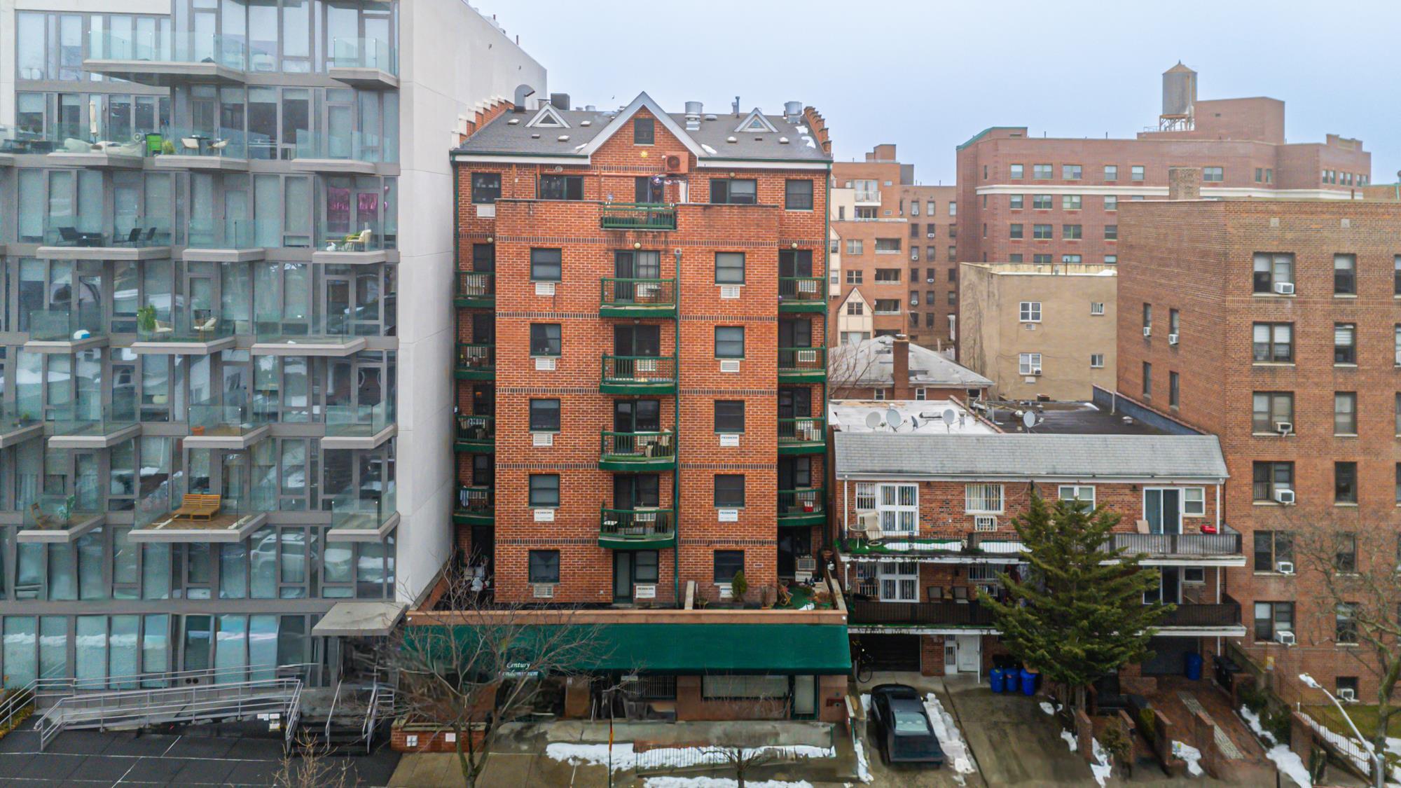 Brick condominium building exterior in Richmond Hill, Queens NY — Homes by Agatha