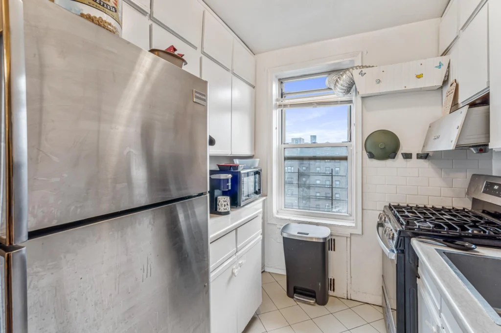 Co-op for sale, Rego Park — windowed galley kitchen at 65-74 Saunders Street, Unit 6J