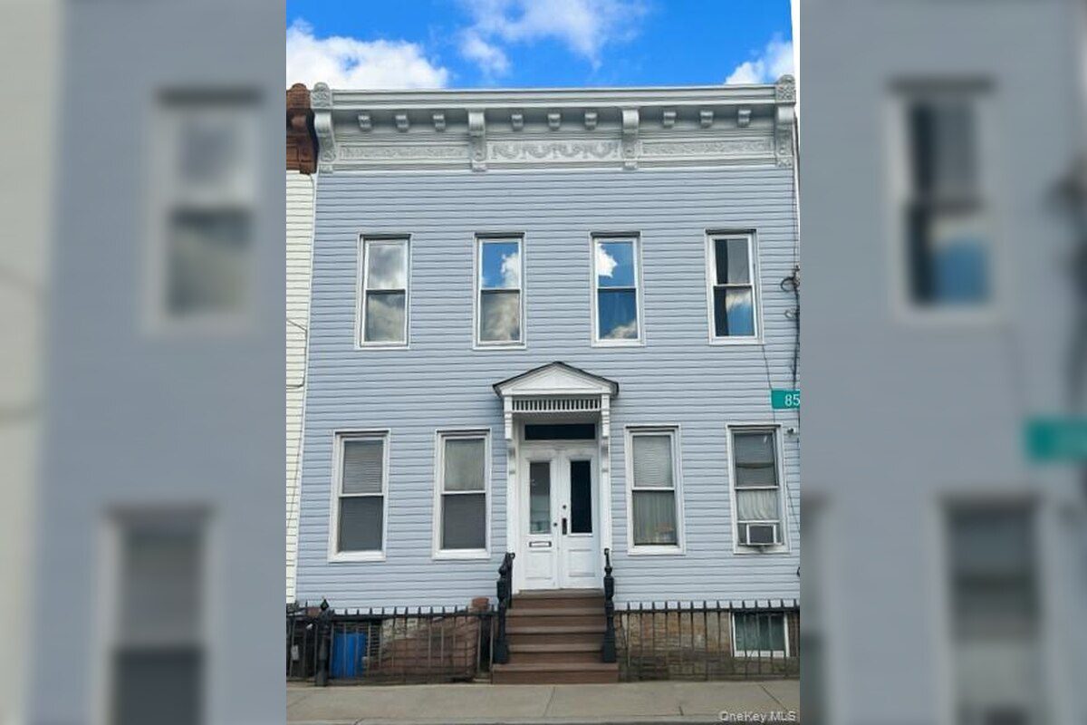Front exterior of the building at 88-23 85th Street, a Woodhaven, Queens NY apartment for rent — Homes by Agatha