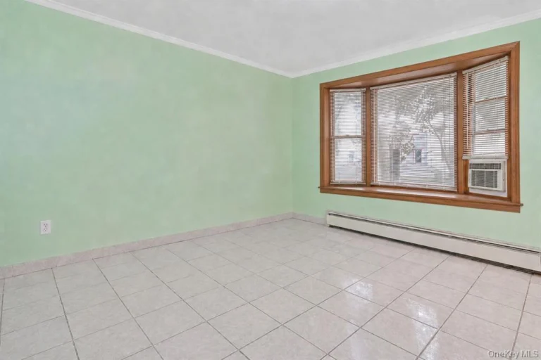 Homes for sale in Ozone Park — 94-32 77th Street living room | Ozone Park Queens NY | Agatha Lubas, Homes by Agatha