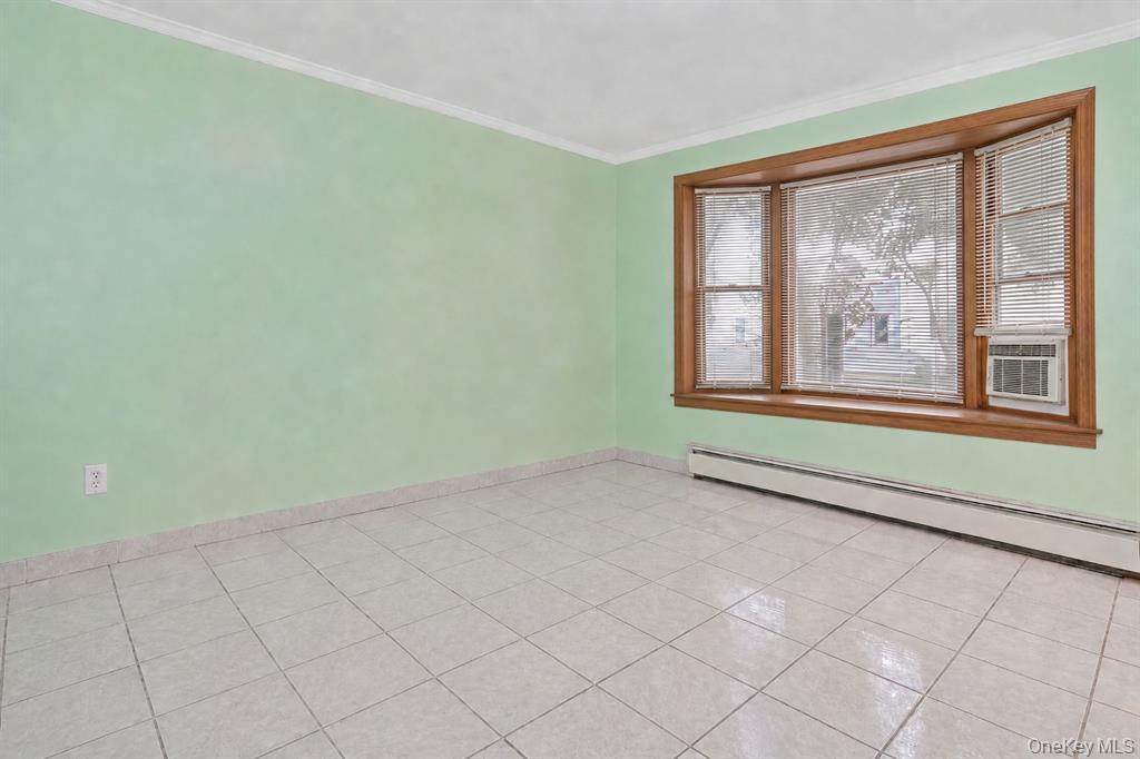 Homes for sale in Ozone Park — 94-32 77th Street living room | Ozone Park Queens NY | Agatha Lubas, Homes by Agatha
