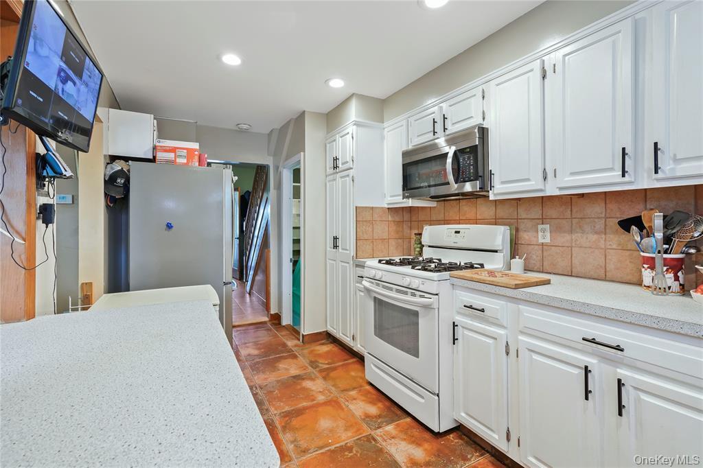 House for sale in Ozone Park, NY 11416 — 94-32 77th Street kitchen | homes for sale Queens NY | Agatha Lubas, Homes by Agatha