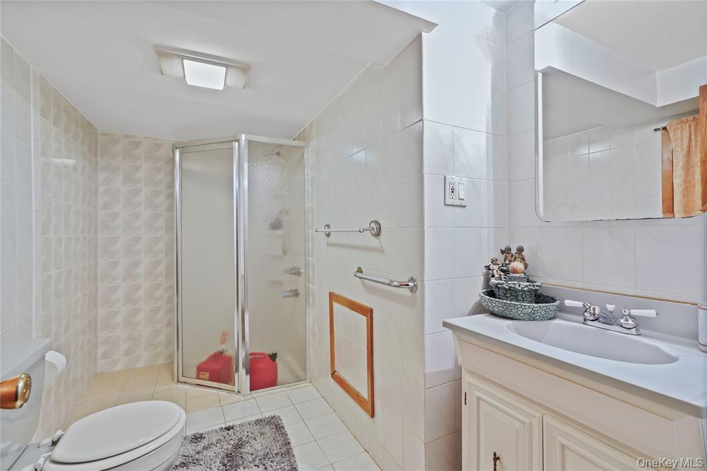 House for sale in Queens, NY — Ozone Park 94-32 77th Street bathroom | homes for sale 11416 | Homes by Agatha
