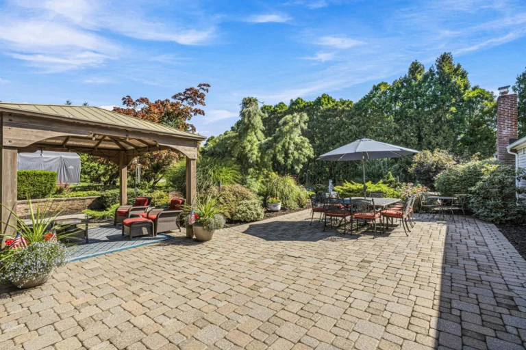 House with backyard for sale in Smithtown, NY — 31 Dehan Street paver patio | homes for sale Long Island | Agatha Lubas, Homes by Agatha realtor