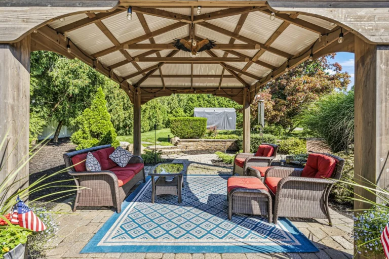 Long Island real estate — 31 Dehan Street covered pergola seating area, Smithtown NY | Suffolk County homes for sale | Homes by Agatha