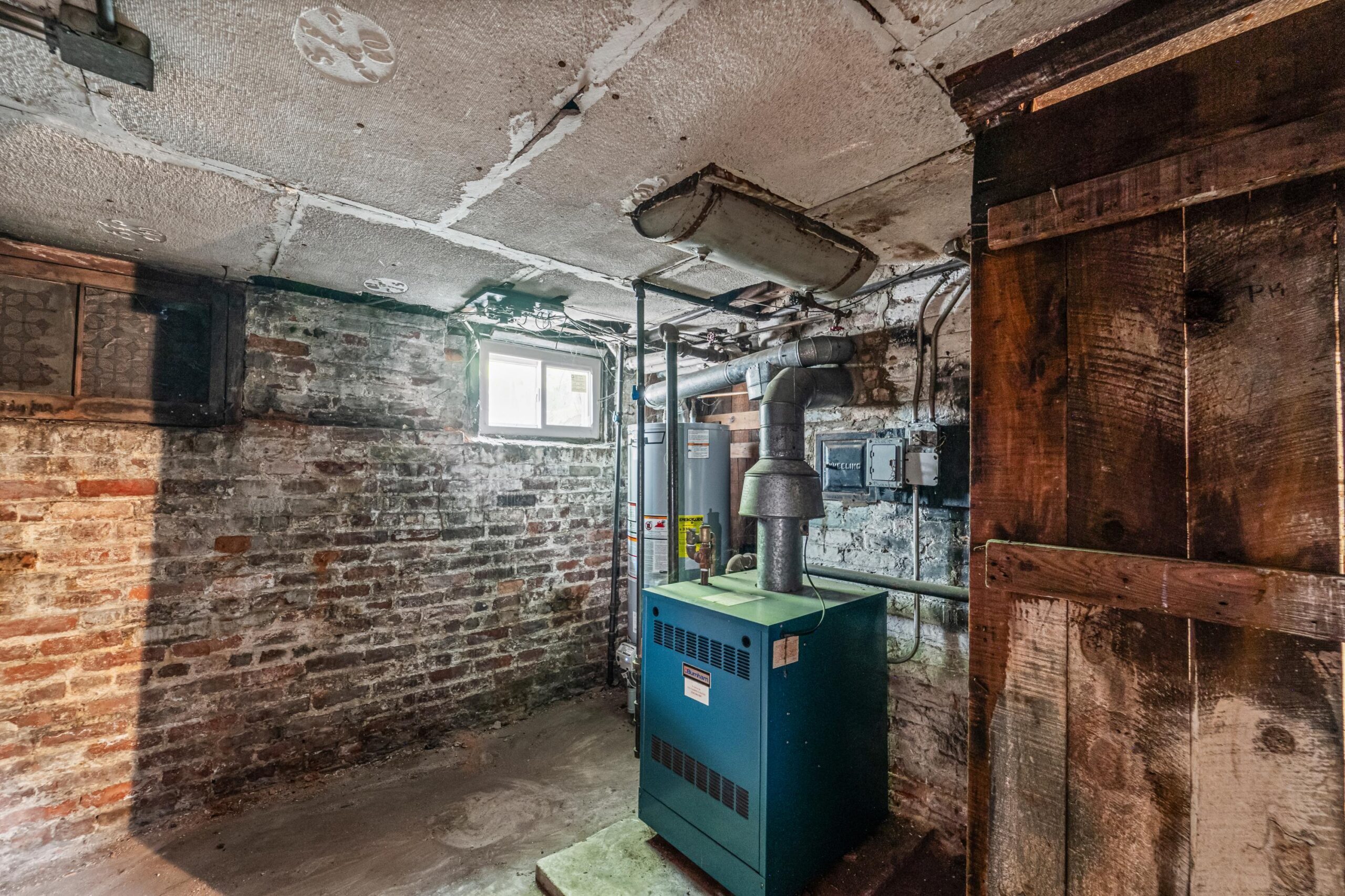 Queens real estate in Maspeth — 54-18 Nurge Avenue basement | two-family with walk-out basement | Homes by Agatha realtor