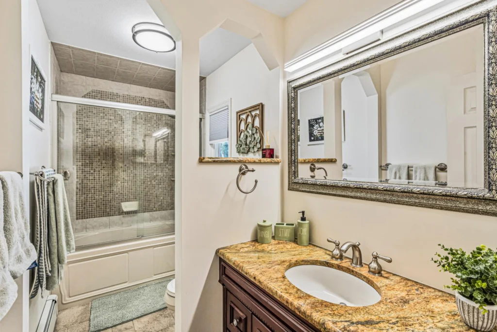 Smithtown homes for sale — 31 Dehan Street full bathroom with granite vanity