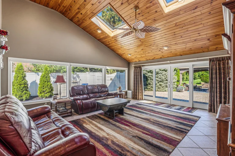 Suffolk County homes for sale — 31 Dehan Street sunroom with wall of glass doors, Smithtown NY | Long Island houses for sale | Agatha Lubas, Homes by Agatha